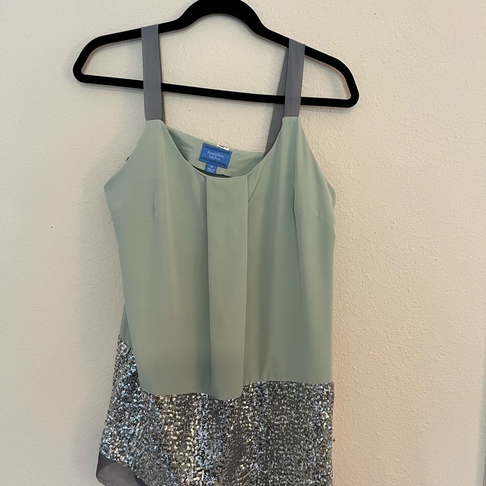 Dressy top by Vets Wang. Zipper is on the side for a perfect fit.